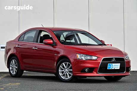 Red 2014 Mitsubishi Lancer Sedan LS