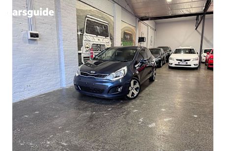 Blue 2012 Kia RIO OtherCar