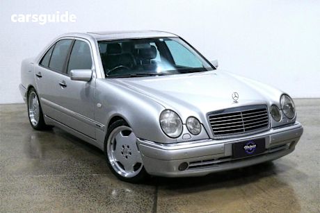 Silver 1999 Mercedes-Benz E55 Sedan AMG