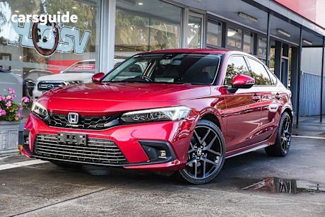 Red 2022 Honda Civic Hatch E:HEV LX F