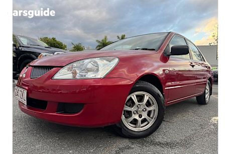 Red 2004 Mitsubishi Lancer Sedan ES