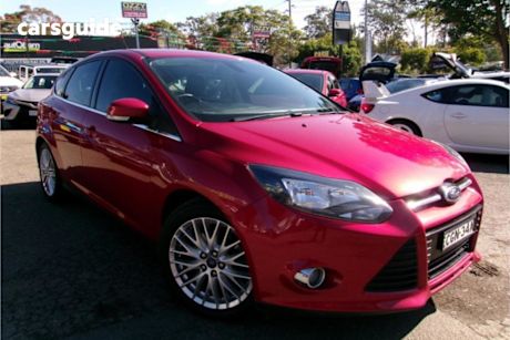 Red 2012 Ford Focus Hatchback Sport