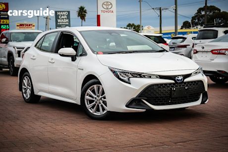 White 2024 Toyota Corolla Hatchback Ascent Sport + Conv PK Hybrid