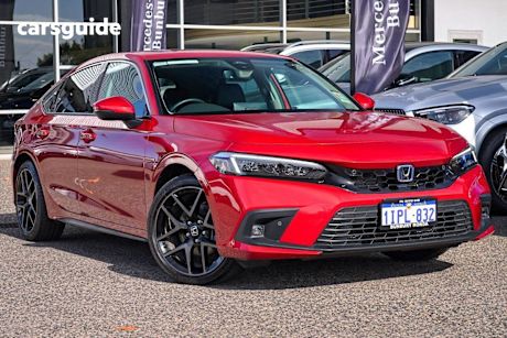Red 2023 Honda Civic Hatch E:HEV LX F