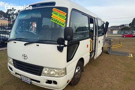 White 2013 Toyota Coaster Commercial