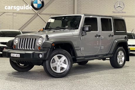 Silver 2013 Jeep Wrangler Convertible Unlimited Sport