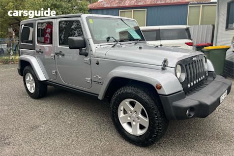 Silver 2014 Jeep Wrangler Unlimited Softtop Freedom (4X4)