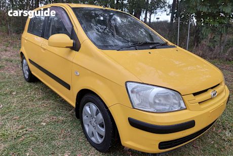 Yellow 2004 Hyundai Getz Hatchback GL