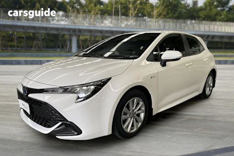 White 2024 Toyota Corolla Hatchback Ascent Sport + Conv PK Hybrid