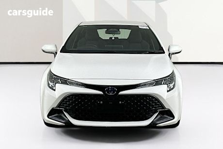 White 2023 Toyota Corolla Hatchback Ascent Sport Hybrid