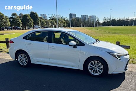 White 2023 Toyota Corolla Sedan Ascent Sport + Conv PK Hybrid