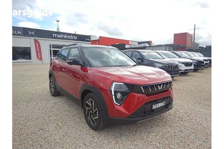 Red 2025 Mahindra XUV3XO SUV