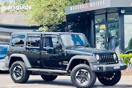 Black 2018 Jeep Wrangler Unlimited Softtop Sport (4X4)