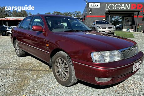 Burgundy 2002 Toyota Avalon Sedan Grande