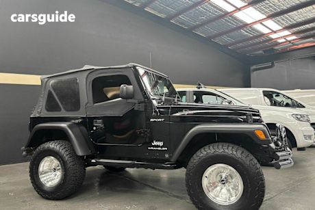 Black 2003 Jeep Wrangler Softtop Sport (4X4)