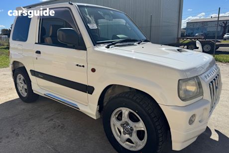 White 1999 Mitsubishi Pajero Mini SUV