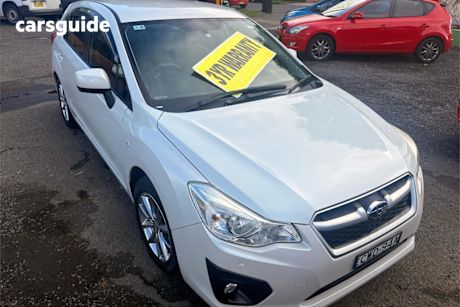 White 2014 Subaru Impreza Hatchback 2.0I (awd)