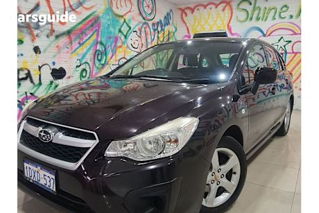 Red 2012 Subaru Impreza Hatchback 2.0I (awd)