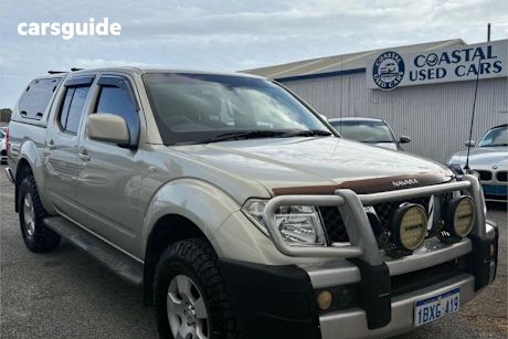 Gold 2010 Nissan Navara Dual Cab Pick-up ST (4X4)