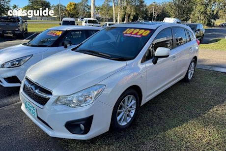 White 2012 Subaru Impreza Hatchback 2.0I (awd)