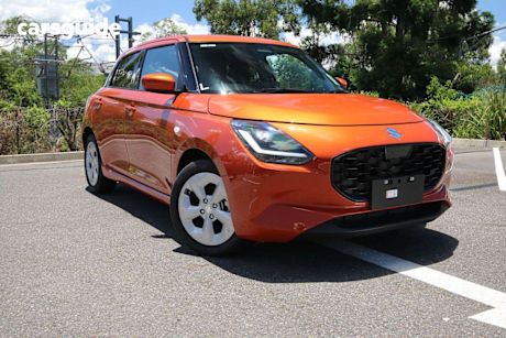 Orange 2024 Suzuki Swift Hatchback Hybrid GLX