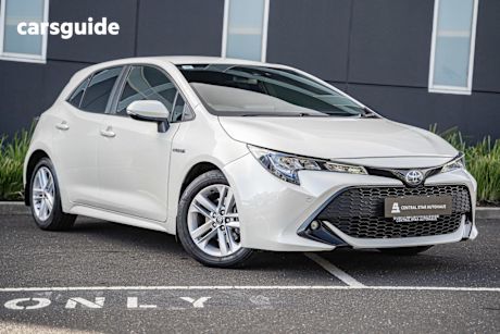 White 2019 Toyota Corolla Hatchback SX (hybrid)