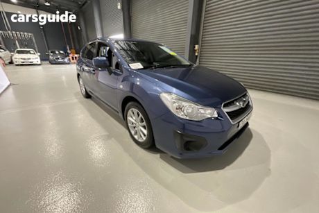 Blue 2013 Subaru Impreza Hatchback 2.0I (awd)