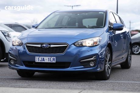 Blue 2017 Subaru Impreza Hatchback 2.0L (awd)
