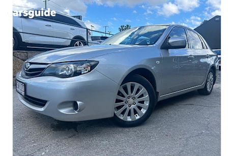 Silver 2009 Subaru Impreza Sedan R 4WD