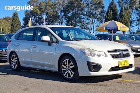 White 2013 Subaru Impreza Hatchback 2.0I (awd)