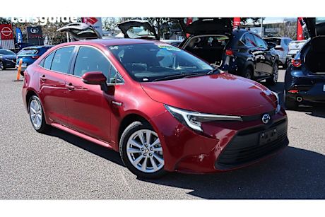 Red 2023 Toyota Corolla Sedan ASCENT SPORT HYBRID F