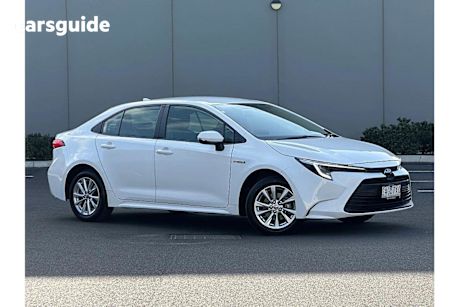 White 2024 Toyota Corolla Sedan ASCENT SPORT HYBRID F