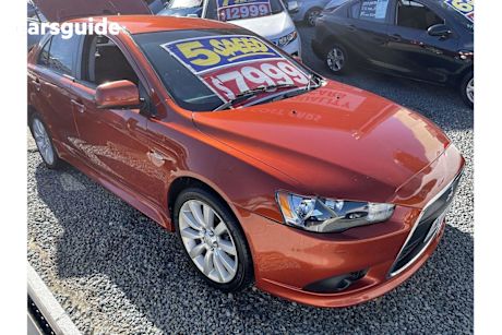 Orange 2012 Mitsubishi Lancer Hatch ACTIV F