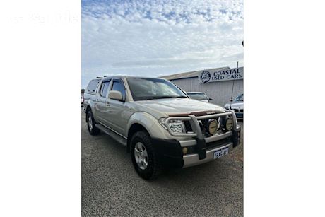 Gold 2010 Nissan Navara Dual Cab Pick-up St (4X4)
