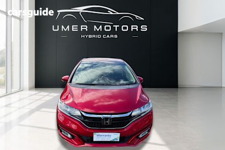 Red 2018 Honda Fit Hatchback (Hybrid)