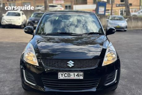 Black 2015 Suzuki Swift Hatchback Gl