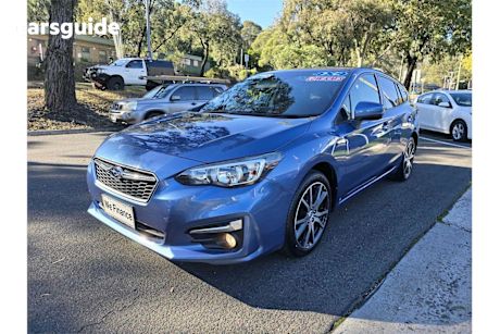 Blue 2017 Subaru Impreza Hatchback 2.0L (awd)