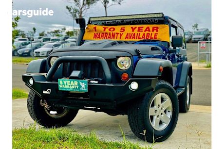 Blue 2009 Jeep Wrangler Hardtop Unlimited Renegade (4X4)