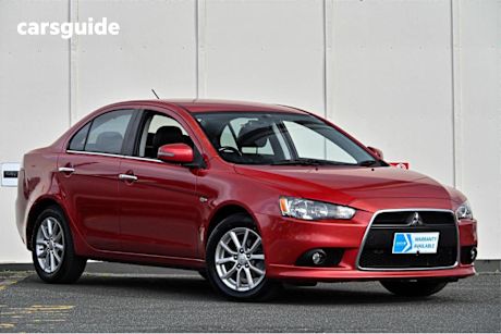 Red 2014 Mitsubishi Lancer Sedan LS F