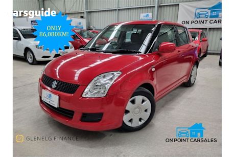 Red 2009 Suzuki Swift Hatchback