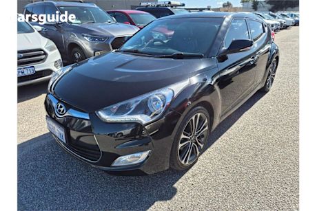 Black 2015 Hyundai Veloster Coupe +