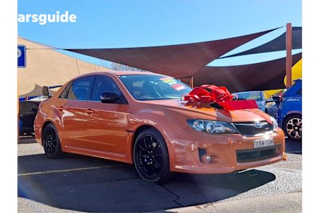 Orange 2012 Subaru Impreza Sedan 2.0I (Awd)
