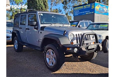 Silver 2013 Jeep Wrangler Sedan UNLIMITED SPORT 4X4