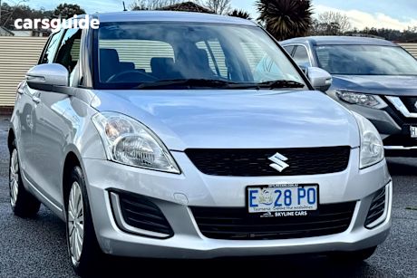 Silver 2015 Suzuki Swift Hatchback Gl