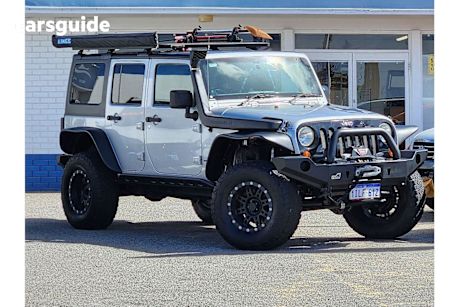 Silver 2011 Jeep Wrangler Sedan UNLIMITED RUBICON 4X4