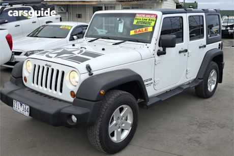White 2012 Jeep Wrangler Softtop Unlimited Sport (4X4)