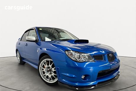 Blue 2005 Subaru Impreza Sedan WRX STI