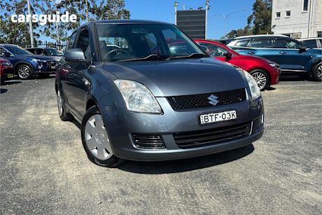 Silver 2010 Suzuki Swift Hatchback