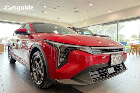 Red 2025 Kia K4 Sedan S F