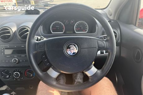 Red 2009 Holden Barina Hatch F
